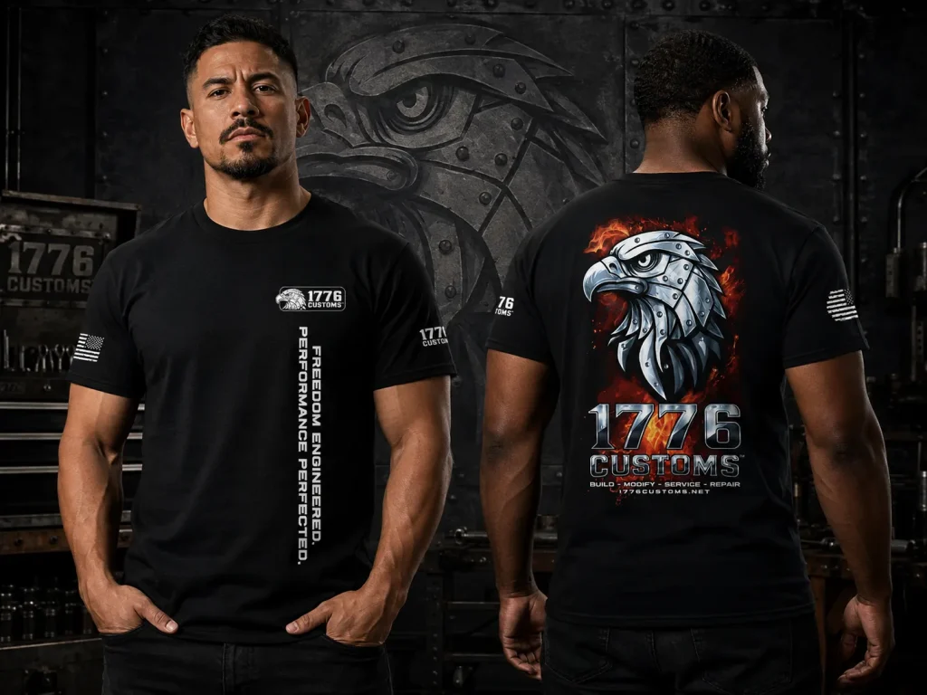 Front and back view of a black 1776 Customs graphic t-shirt with a flaming mechanical eagle print.