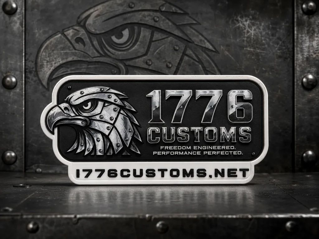 1776 Customs rubber silicone Velcro patch with 3D mechanical eagle head logo, slogan, and website URL.